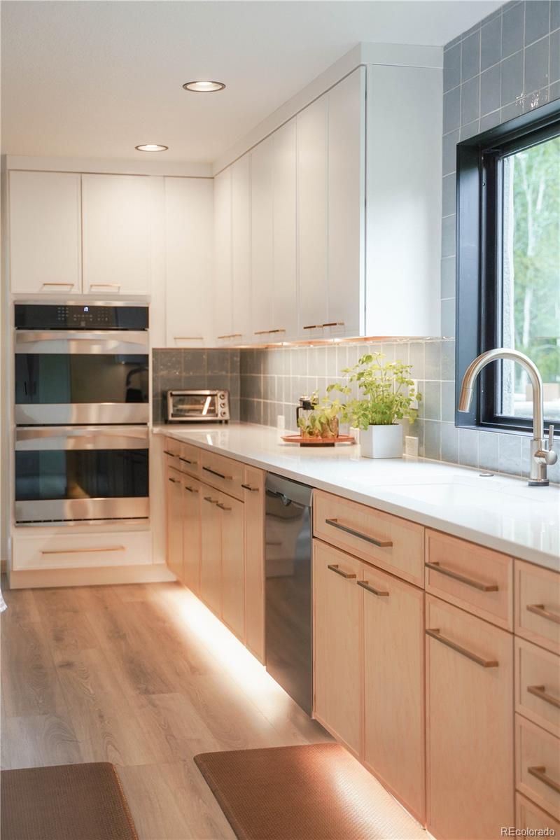 1709 Red Hawk Road Silverthorne, CO 80498 - Photo 11 of 50 a kitchen with cabinets appliances and a window