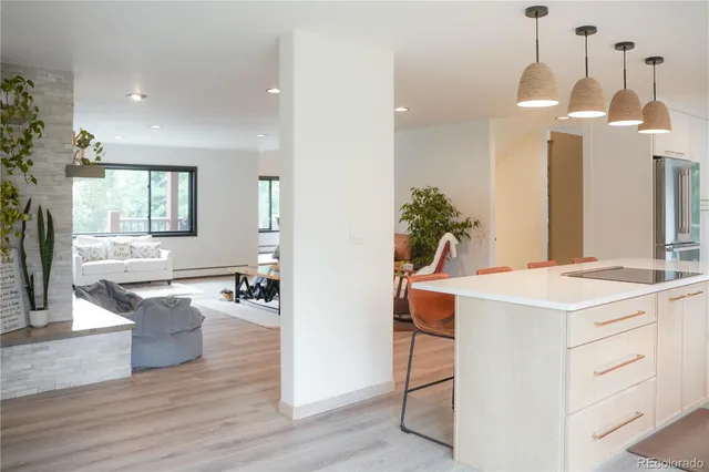 a view of a kitchen and dining room