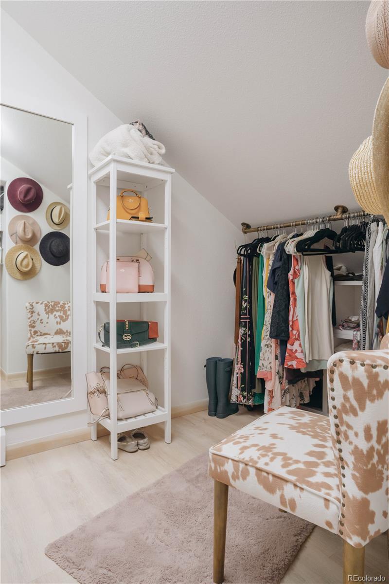 1709 Red Hawk Road Silverthorne, CO 80498 - Photo 30 of 50 a bedroom with a bed and a mirror