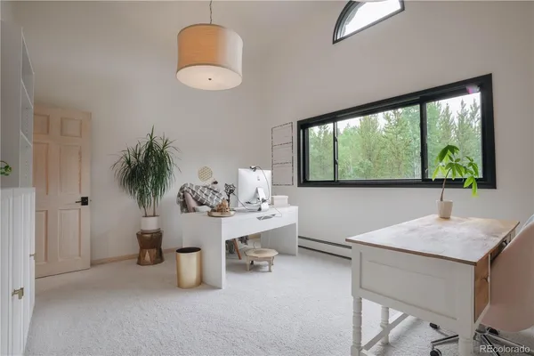 a room with furniture and a window