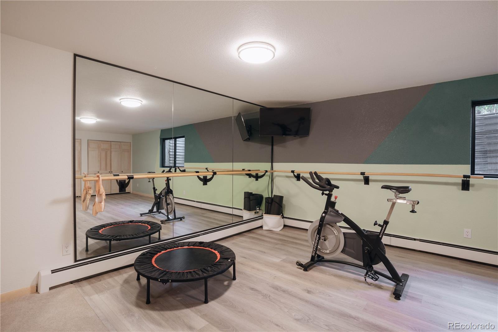 1709 Red Hawk Road Silverthorne, CO 80498 - Photo 41 of 50 a room with gym equipment and air hockey table