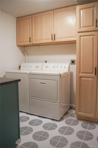 a kitchen with a sink and a refrigerator