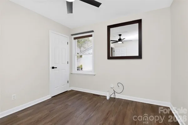 an empty room with window