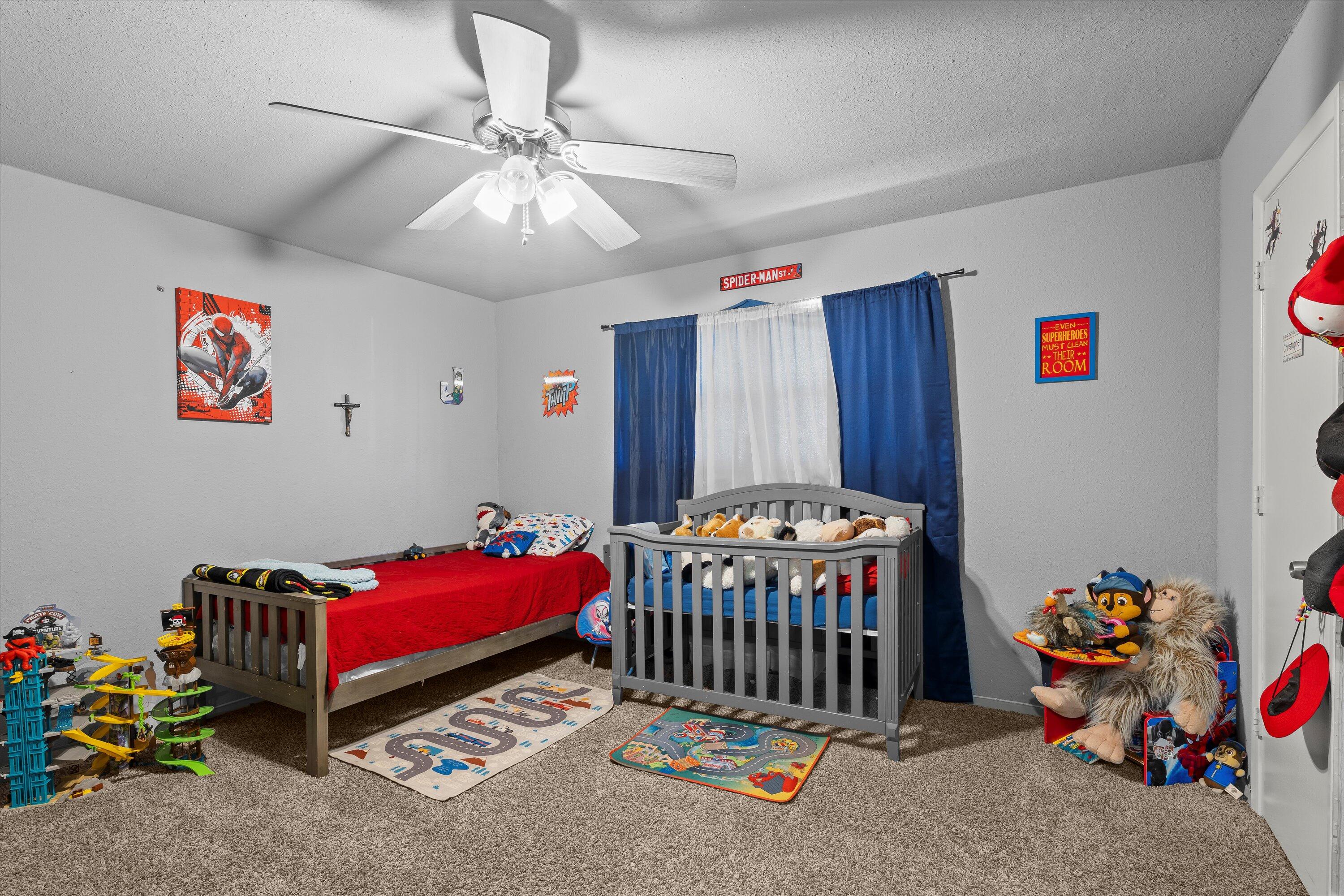 3718 South State Road, Unit 303 Sundown, TX 79372 - Photo 15 of 23 a bedroom with furniture and a bed