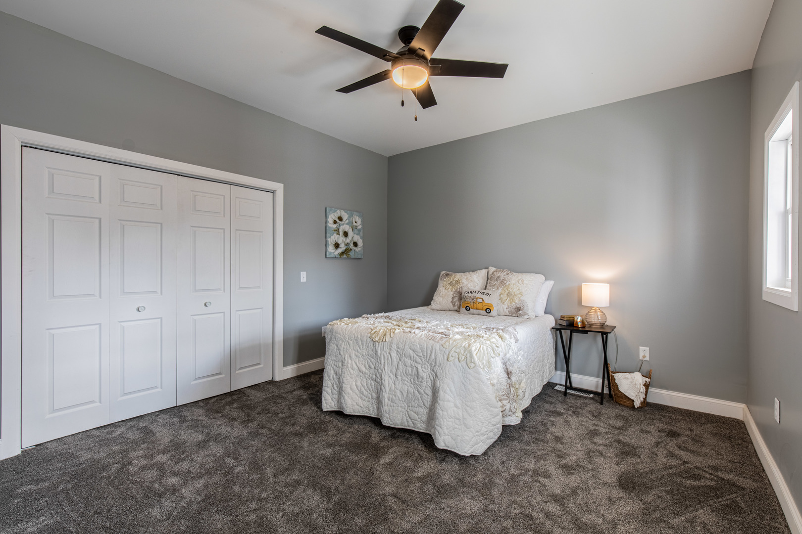 204 East South Street Sheffield, IL 61361 - Photo 12 of 30 a bedroom with a bed and a ceiling fan