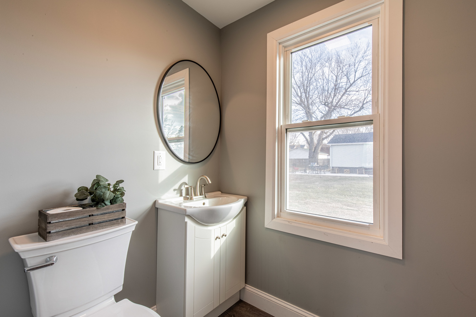 204 East South Street Sheffield, IL 61361 - Photo 13 of 30 a bathroom with a toilet sink mirror and vanity
