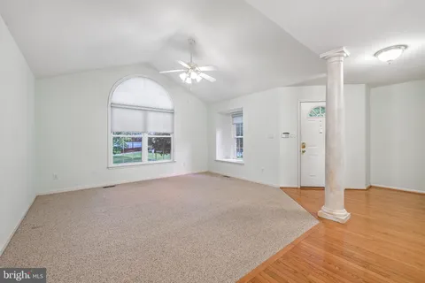 a view of a livingroom with furniture