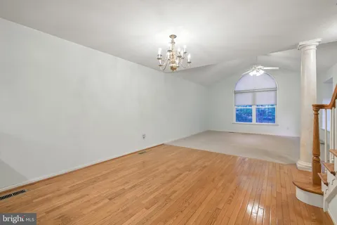 a kitchen with stainless steel appliances a refrigerator sink and cabinets