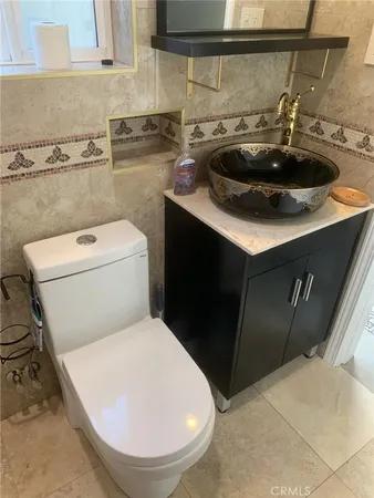 a bathroom with a sink and a toilet