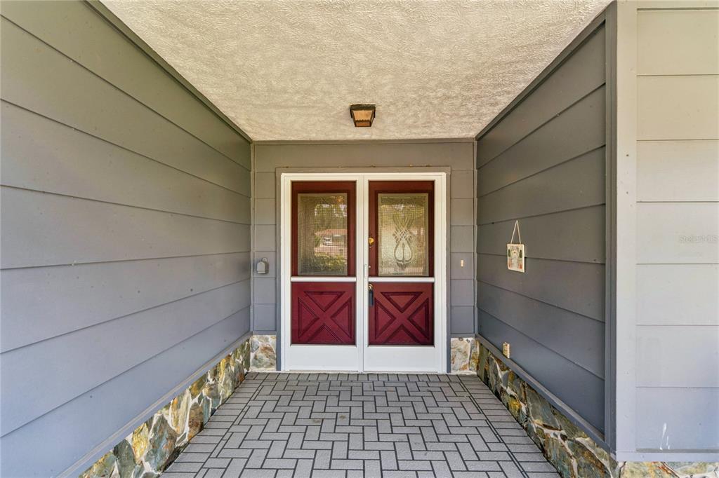 2252 Pebble Beach Drive Spring Hill, FL 34606 - Photo 4 of 100 a view of a entryway door of the house
