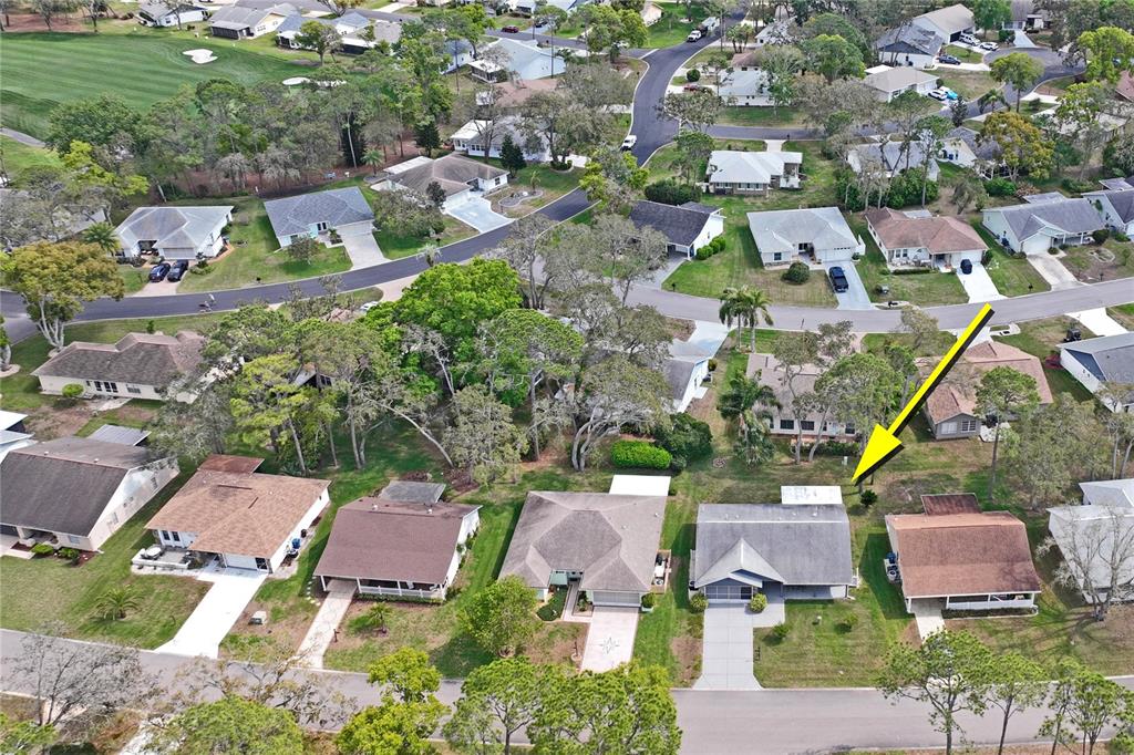 2252 Pebble Beach Drive Spring Hill, FL 34606 - Photo 45 of 100 an aerial view of residential houses with outdoor space and street view