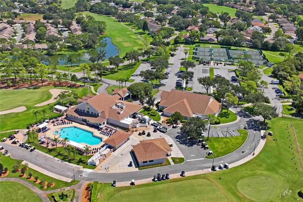 2252 Pebble Beach Drive Spring Hill, FL 34606 - Photo 56 of 100 an aerial view of residential houses with outdoor space and swimming pool