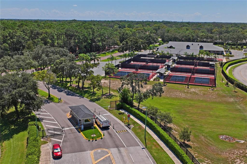 2252 Pebble Beach Drive Spring Hill, FL 34606 - Photo 99 of 100 an aerial view of a house with garden space and lake view