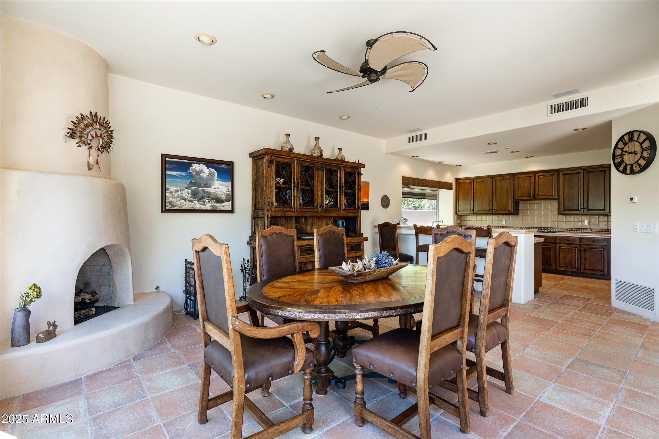 34221 North Boulders Parkway Scottsdale, AZ 85266 - Photo 12 of 31 a dining room with furniture and window
