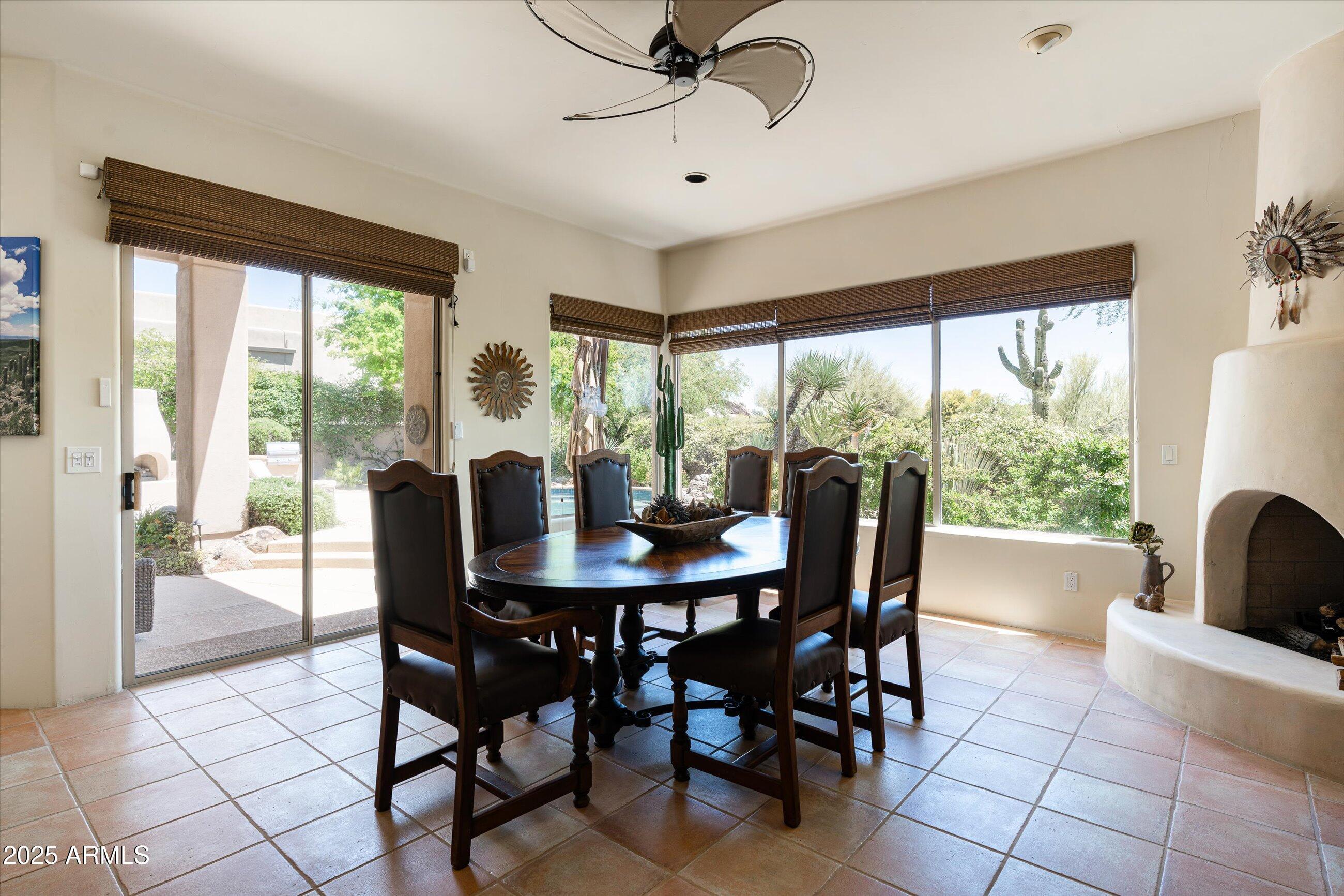 34221 North Boulders Parkway Scottsdale, AZ 85266 - Photo 13 of 31 a view of a dining room with furniture window and outside view