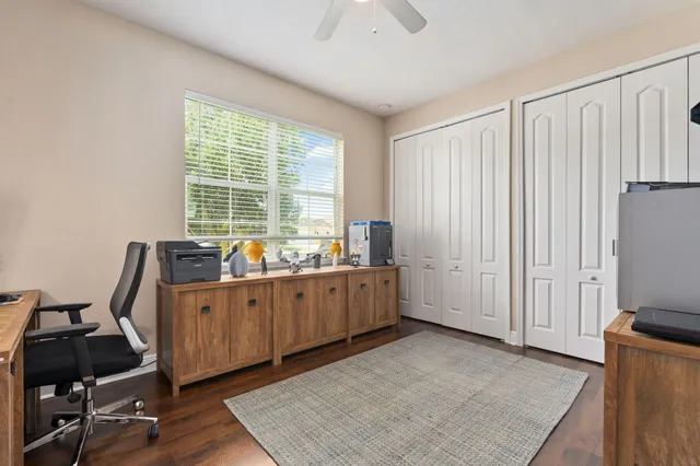 a view of room with window and hardwood floor
