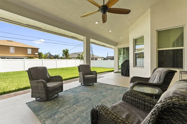 a view of a house and a yard with green space