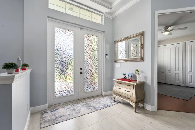 a room with furniture and a window