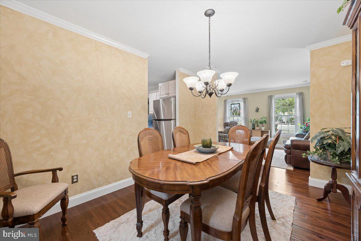 19829 Spurrier Avenue Poolesville, MD 20837 - Photo 9 of 72 Elegant dining space with warm tones.