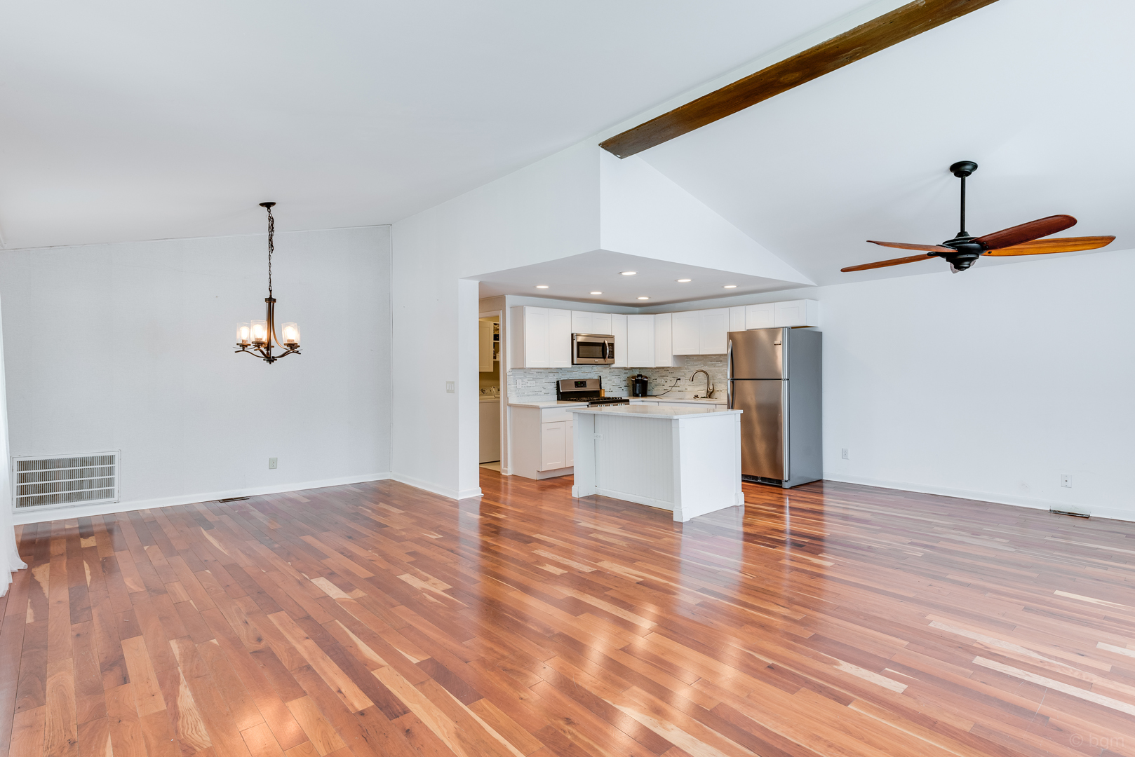 1110 Lakewood Road Elgin, IL 60123 - Photo 2 of 24 a view of kitchen and hall with wooden floor