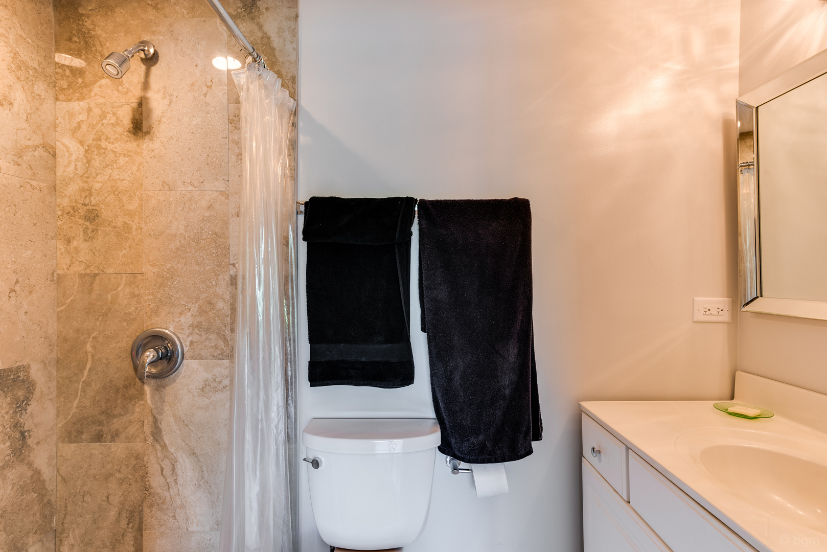 1110 Lakewood Road Elgin, IL 60123 - Photo 15 of 24 a bathroom with a sink a toilet and shower