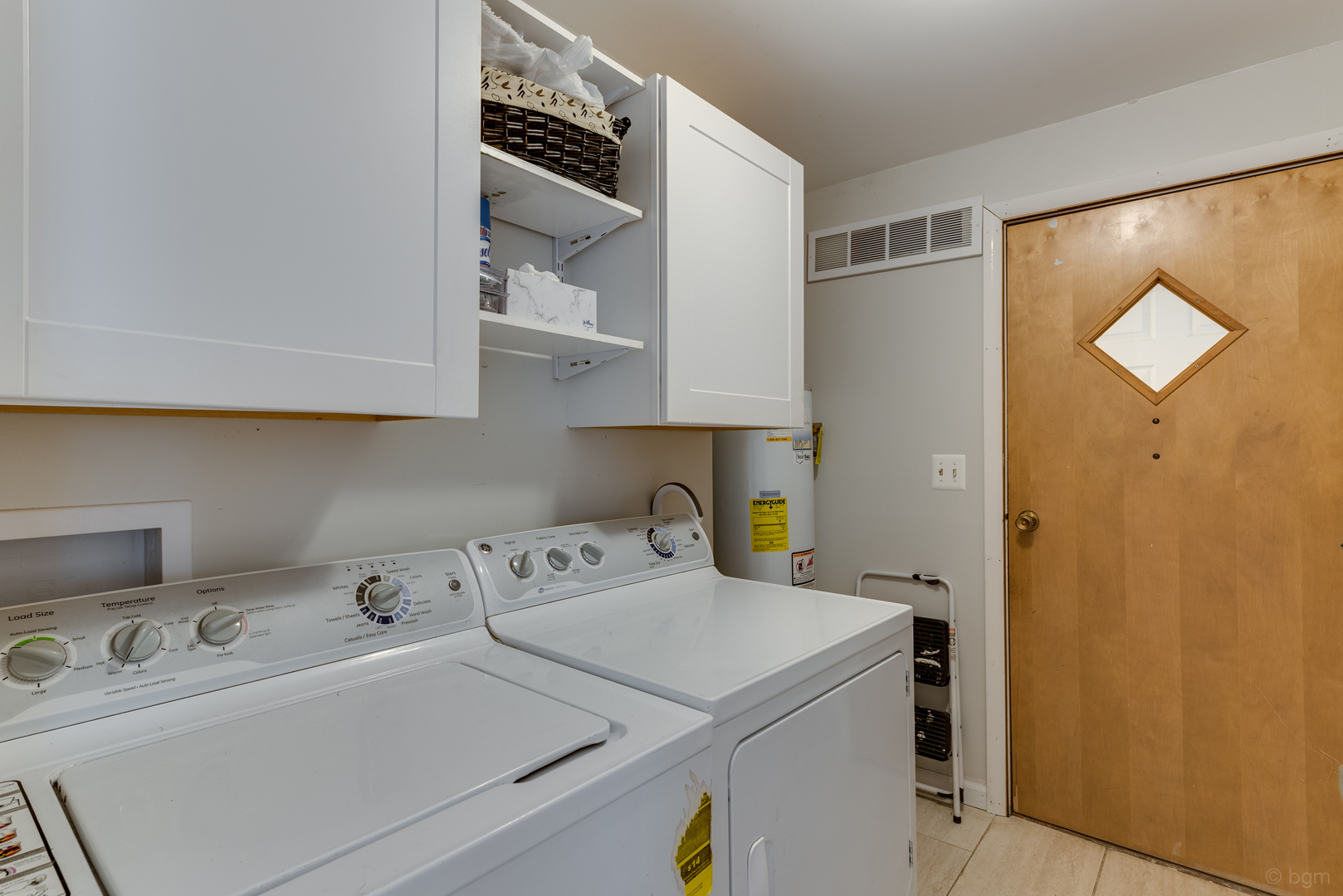 1110 Lakewood Road Elgin, IL 60123 - Photo 19 of 24 a view of storage and utility room with washer and dryer