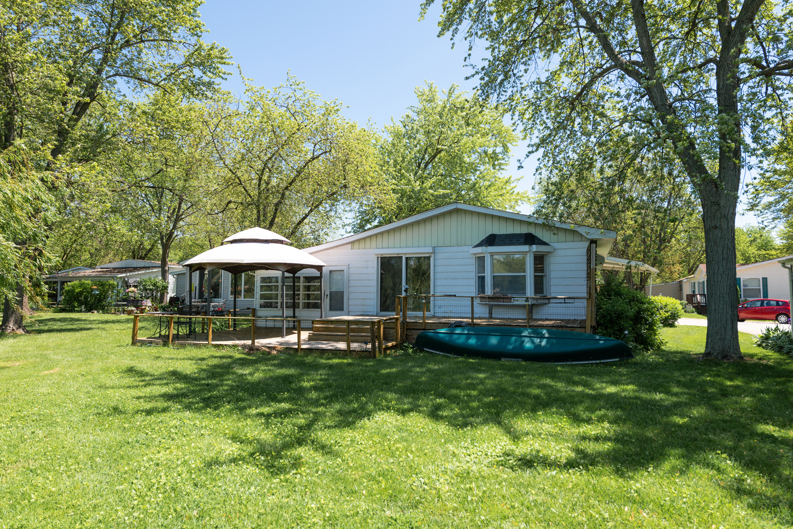1110 Lakewood Road Elgin, IL 60123 - Photo 24 of 24 a backyard of a house with table and chairs