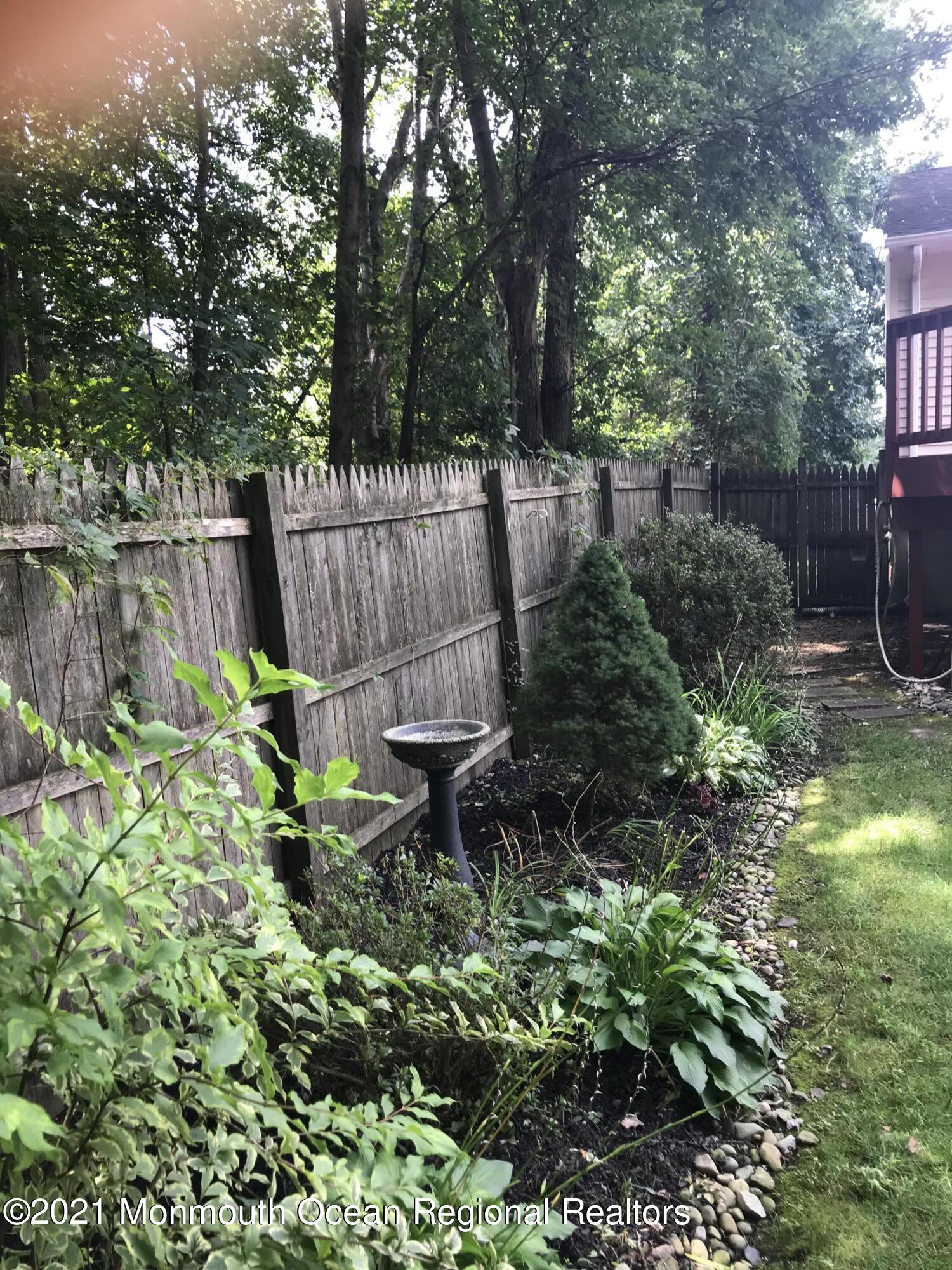 21 Kuzyk Road Cream Ridge, NJ 08514 - Photo 15 of 45 a garden view with a seating space