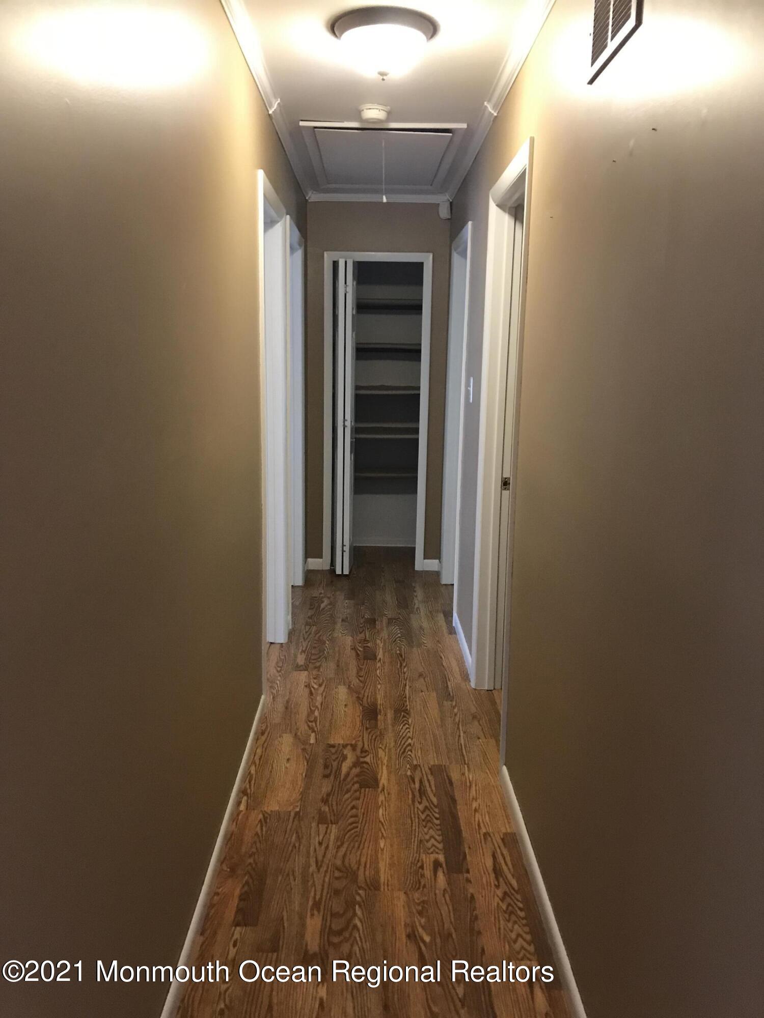 21 Kuzyk Road Cream Ridge, NJ 08514 - Photo 26 of 45 a view of hallway with wooden floor