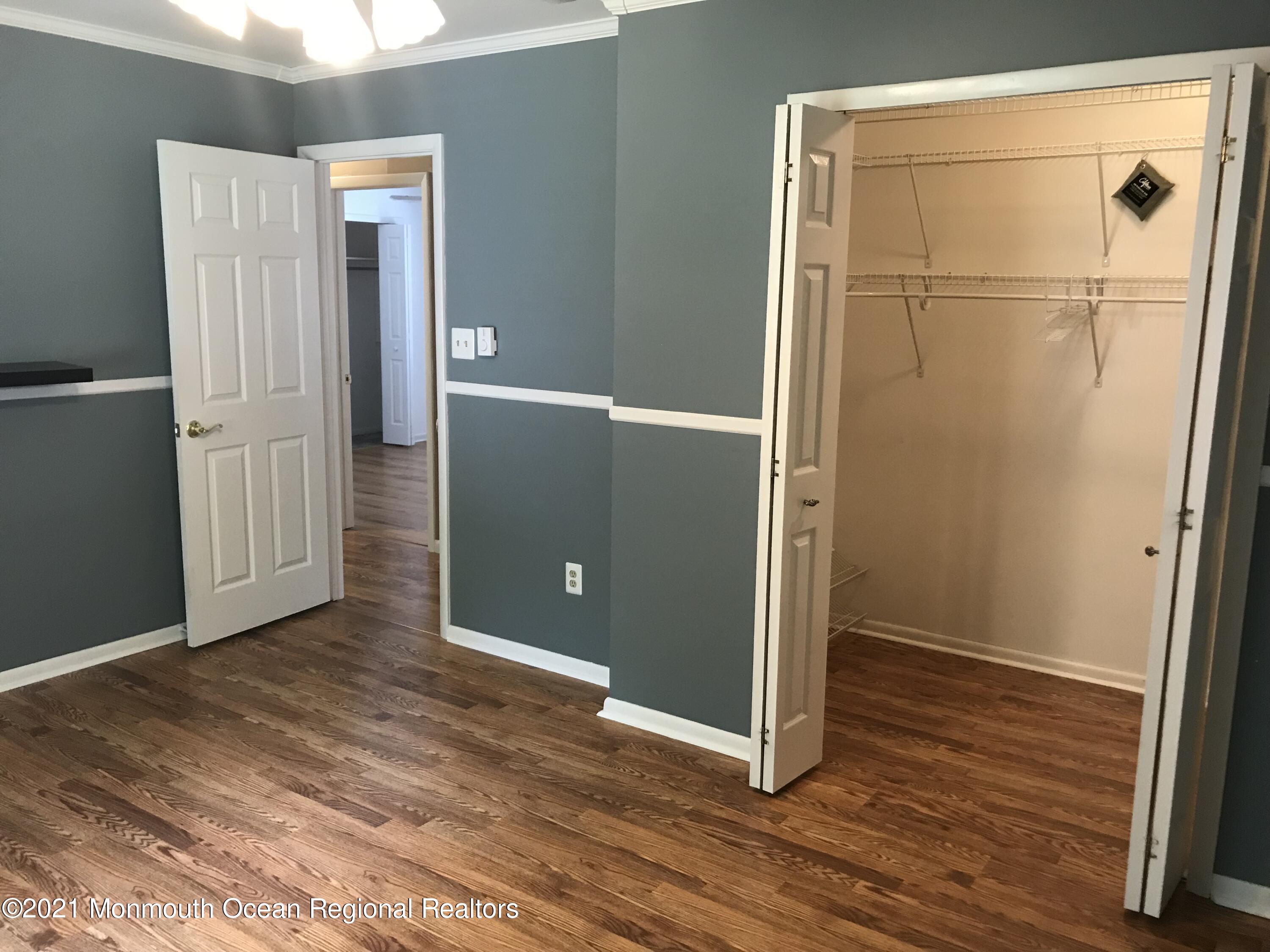 21 Kuzyk Road Cream Ridge, NJ 08514 - Photo 33 of 45 an empty room with wooden floor