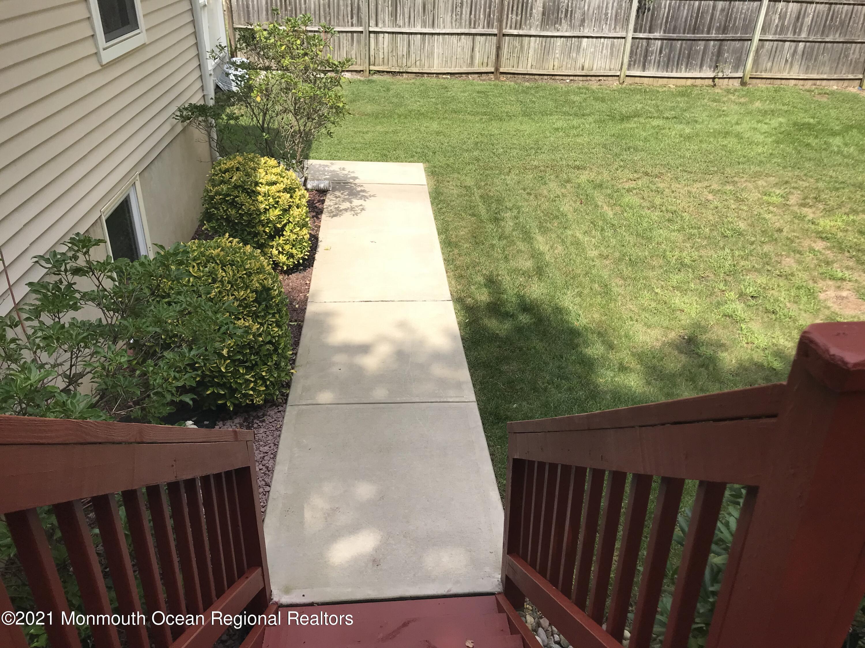 21 Kuzyk Road Cream Ridge, NJ 08514 - Photo 8 of 45 a view of a backyard with pathway