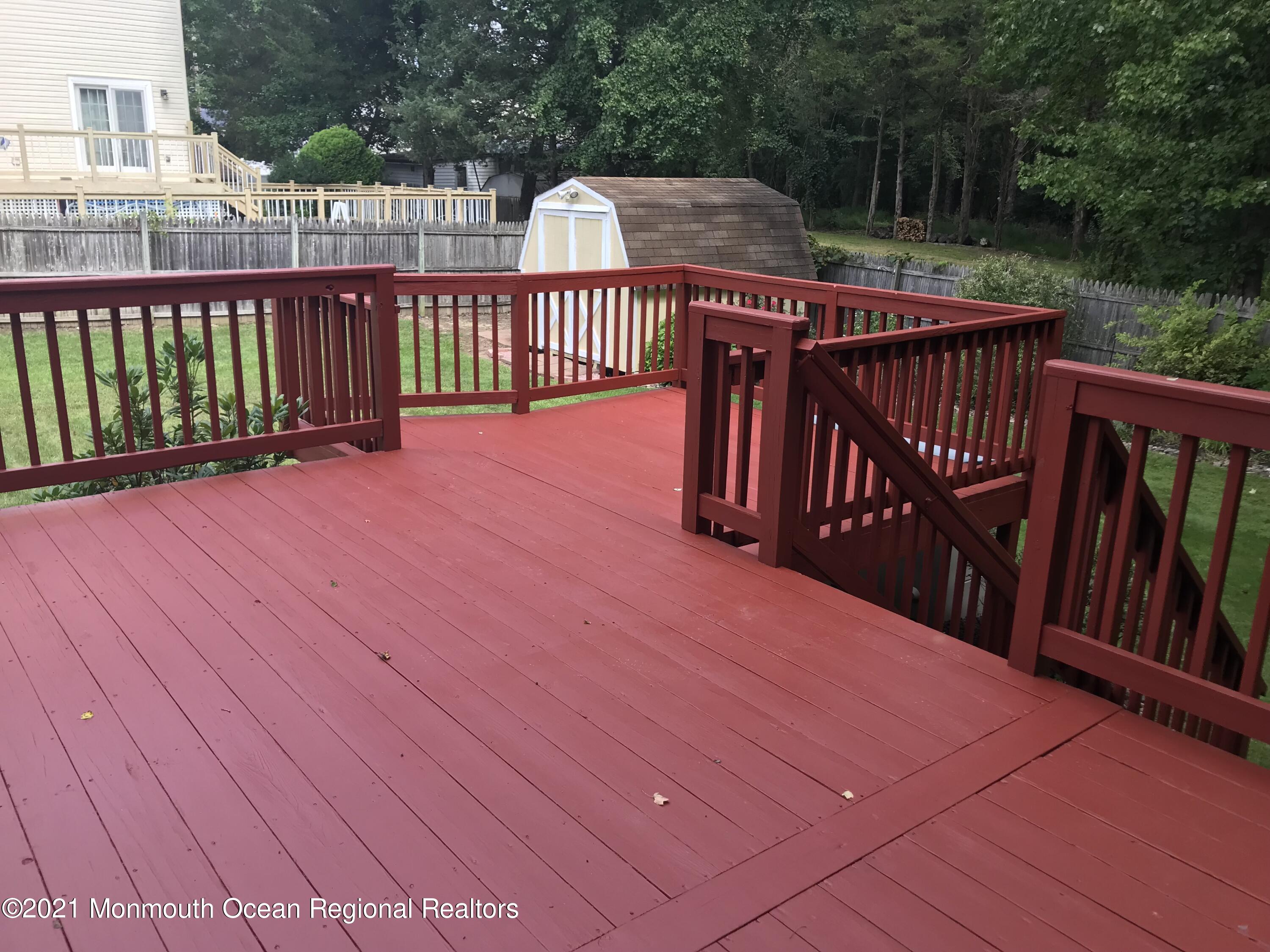 21 Kuzyk Road Cream Ridge, NJ 08514 - Photo 9 of 45 a view of street with deck and backyard