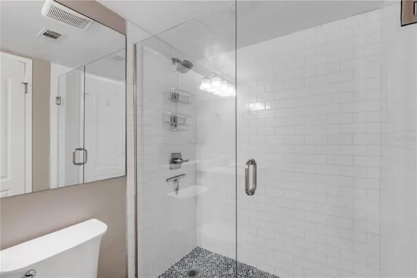 a room with furniture and flat screen tv