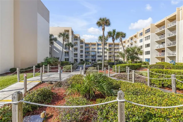 a view of a city with an ocean view