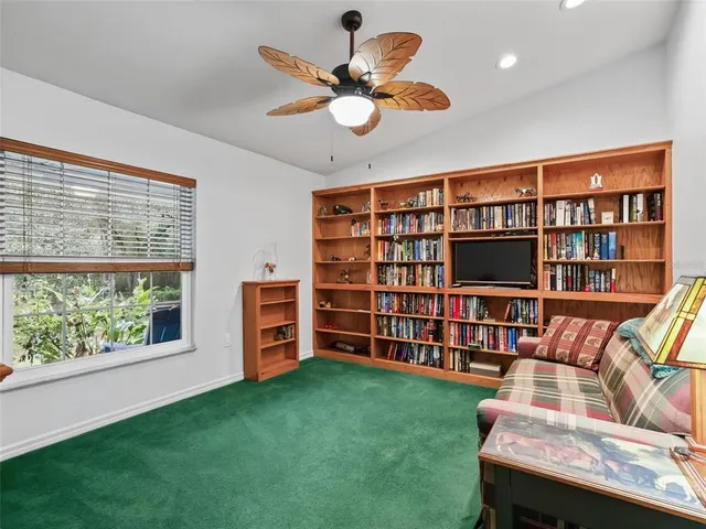 a spacious bathroom with a double vanity sink a and a mirror
