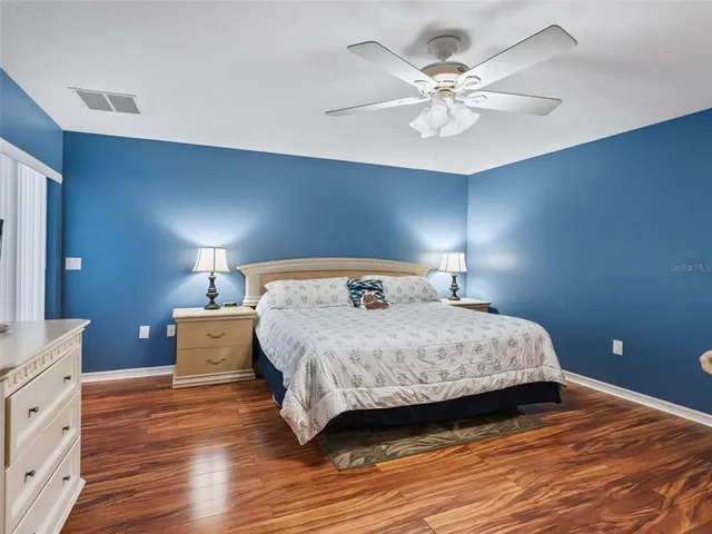 a bed room with a bed and a couch