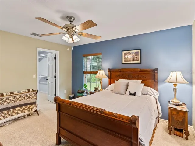 a view of a chair and table on the patio