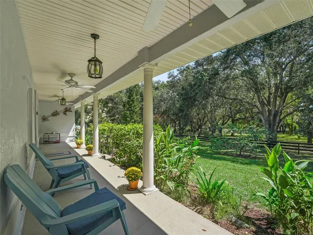 a kitchen with stainless steel appliances granite countertop wooden cabinets stove top oven and sink