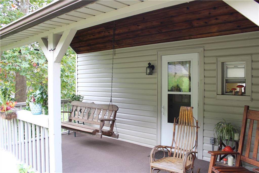 3241 Ridge Rd Extension Freedom, PA 15042 - Photo 12 of 16 Brand new outdoor carpet installed on front porch Oct 2018