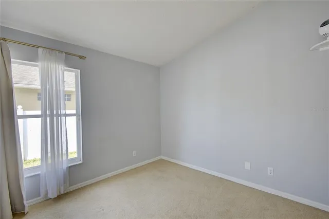 a bathroom with a sink toilet vanity and shower