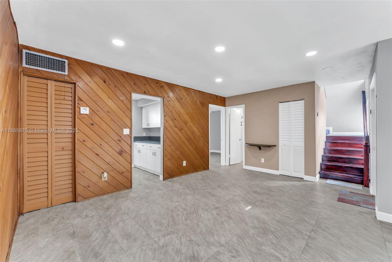 10927 Southwest 71st Lane Miami, FL 33173 - Photo 11 of 34 a view of an empty room with a fireplace