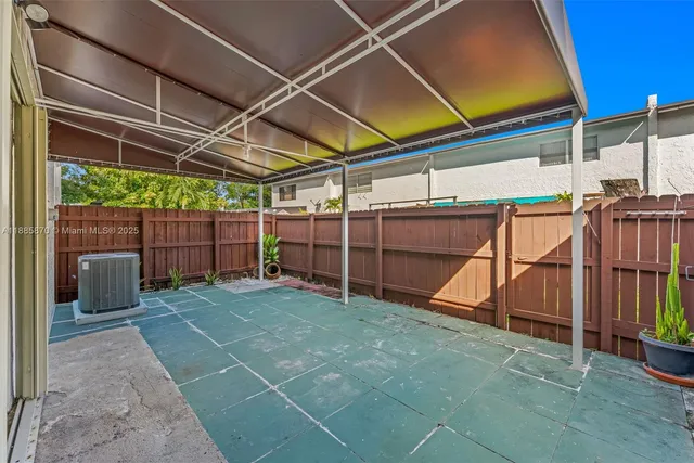 a bathroom with a shower and a sink