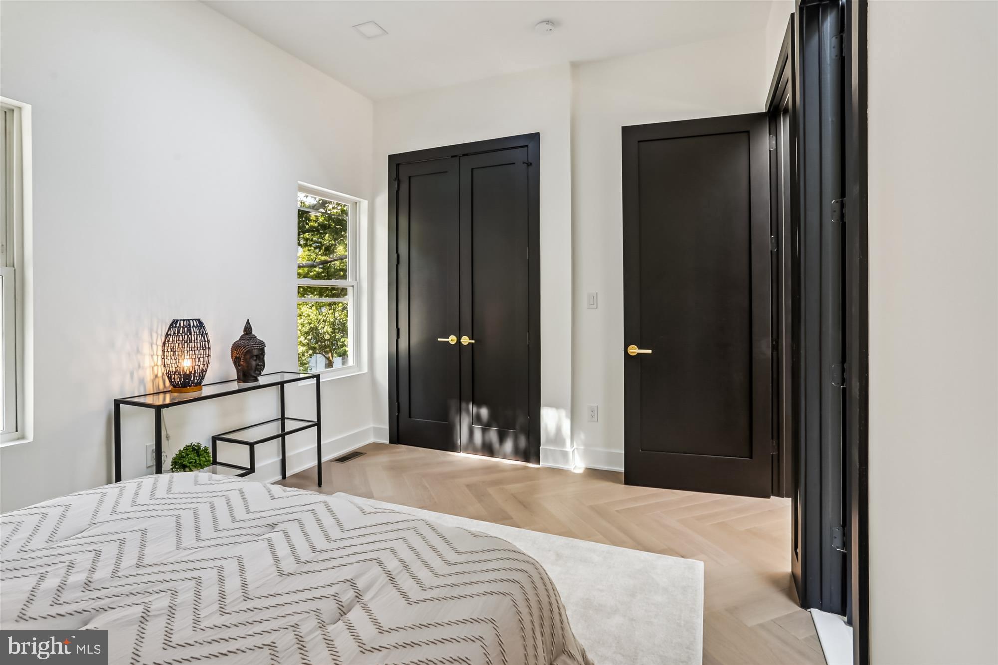 1832 Florida Avenue Northwest Washington, DC 20009 - Photo 14 of 60 a bedroom with a bed and a dresser