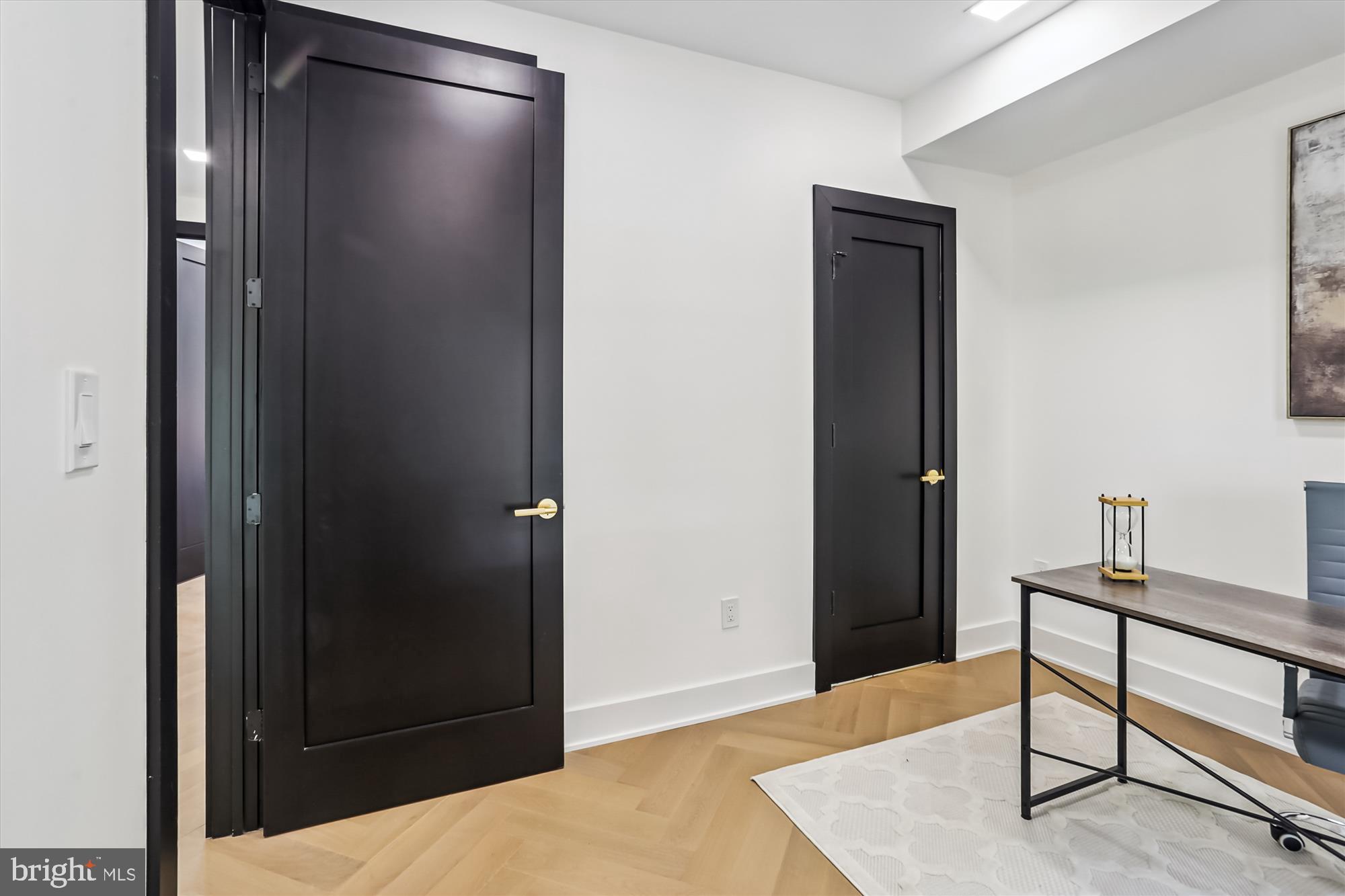1832 Florida Avenue Northwest Washington, DC 20009 - Photo 42 of 60 a bedroom with a bed and a dresser