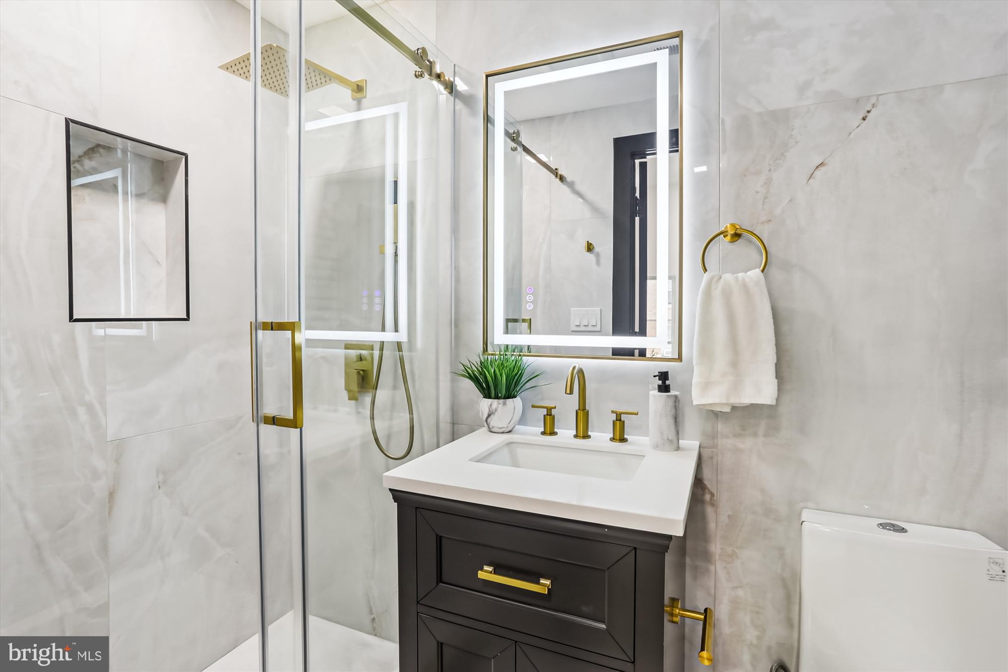 1832 Florida Avenue Northwest Washington, DC 20009 - Photo 43 of 60 a bathroom with a sink and a mirror