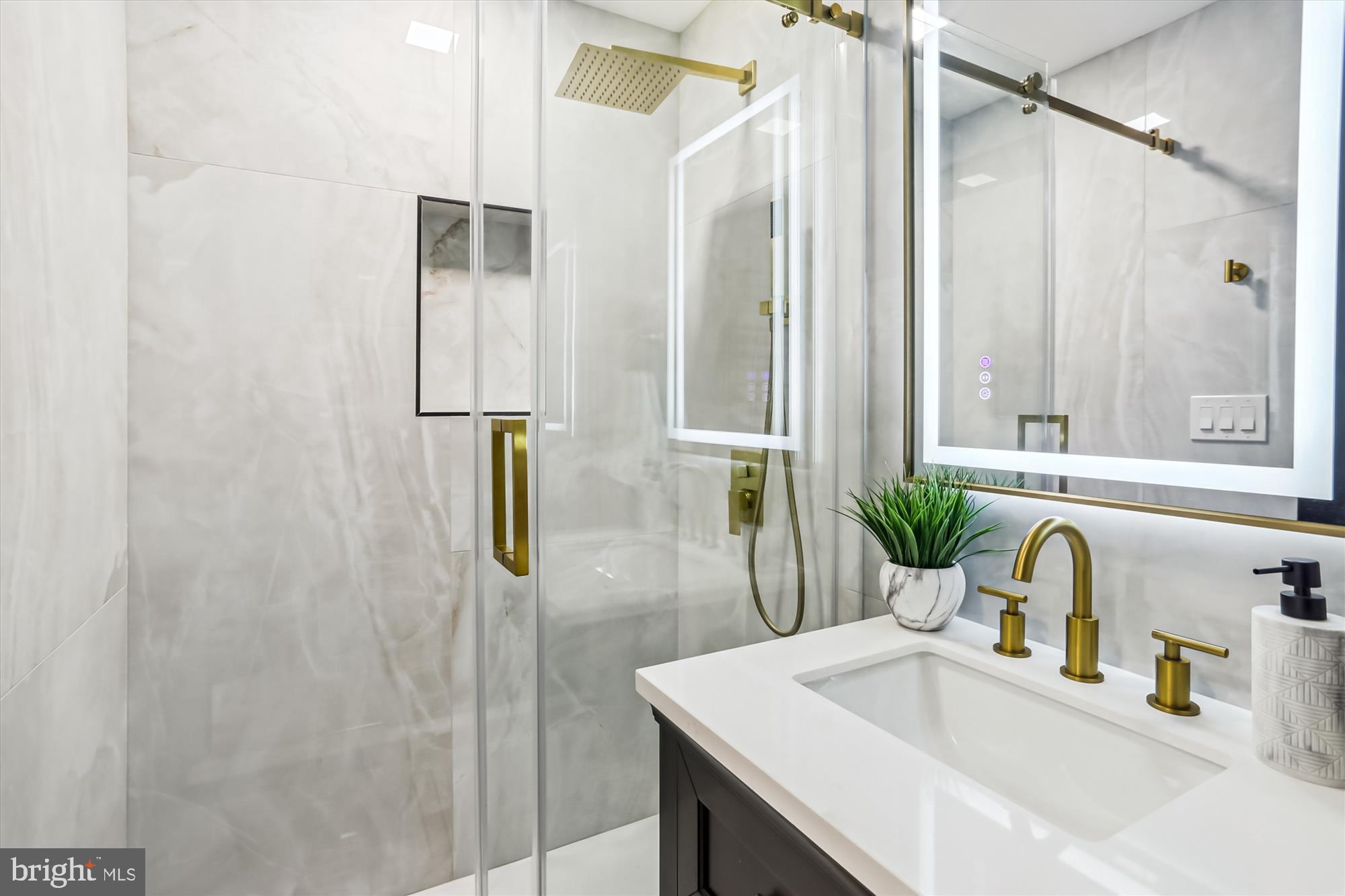 1832 Florida Avenue Northwest Washington, DC 20009 - Photo 44 of 60 a bathroom with a sink and a mirror
