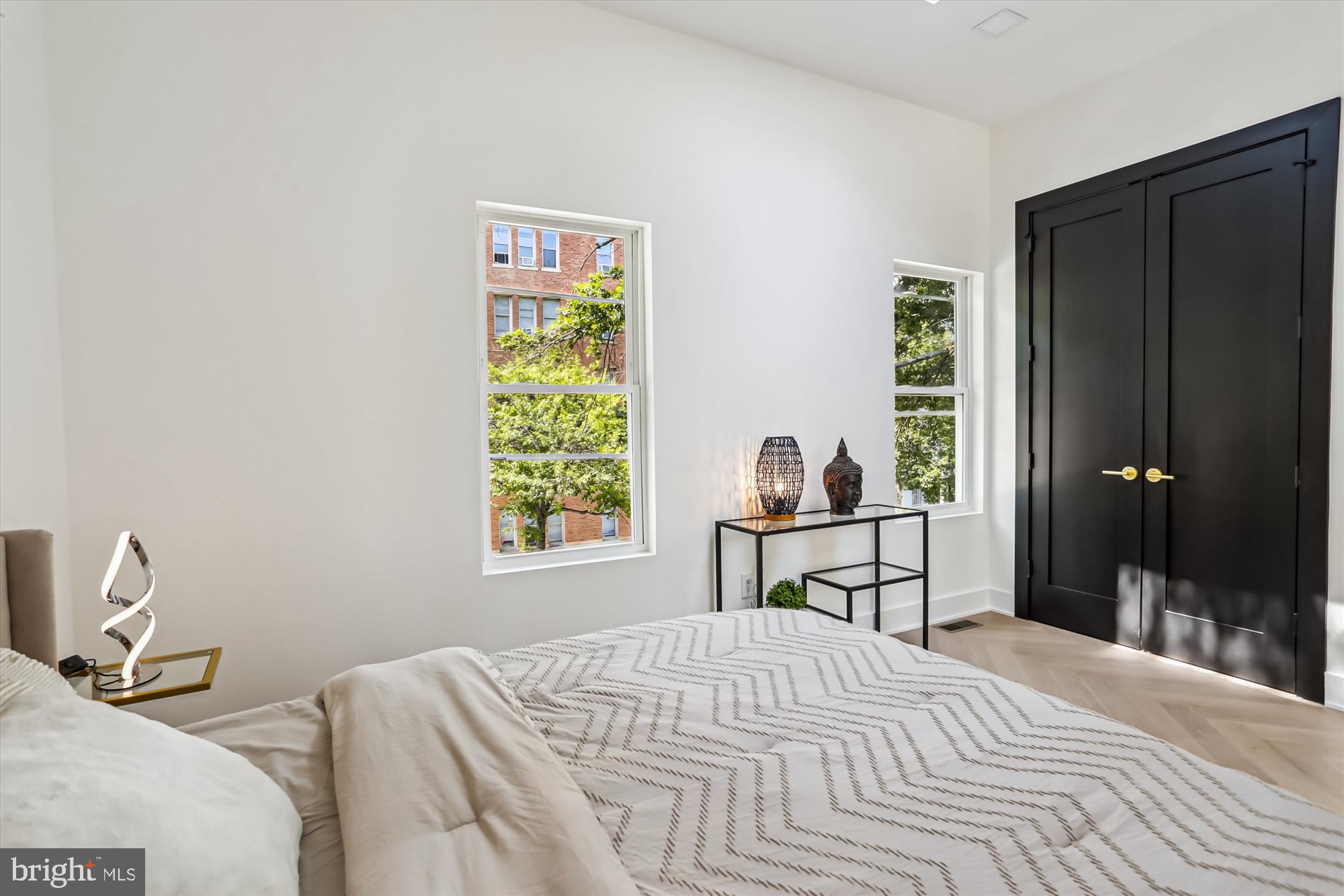 1832 Florida Avenue Northwest Washington, DC 20009 - Photo 46 of 60 a bedroom with a bed and a window