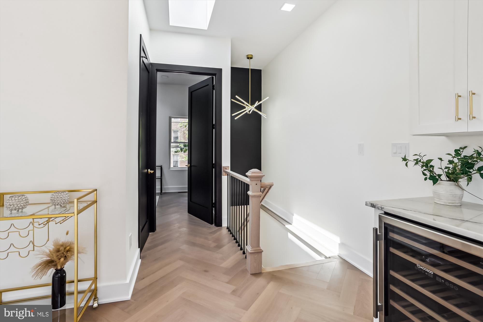 1832 Florida Avenue Northwest Washington, DC 20009 - Photo 10 of 60 a view of a hallway and closet with wooden floor