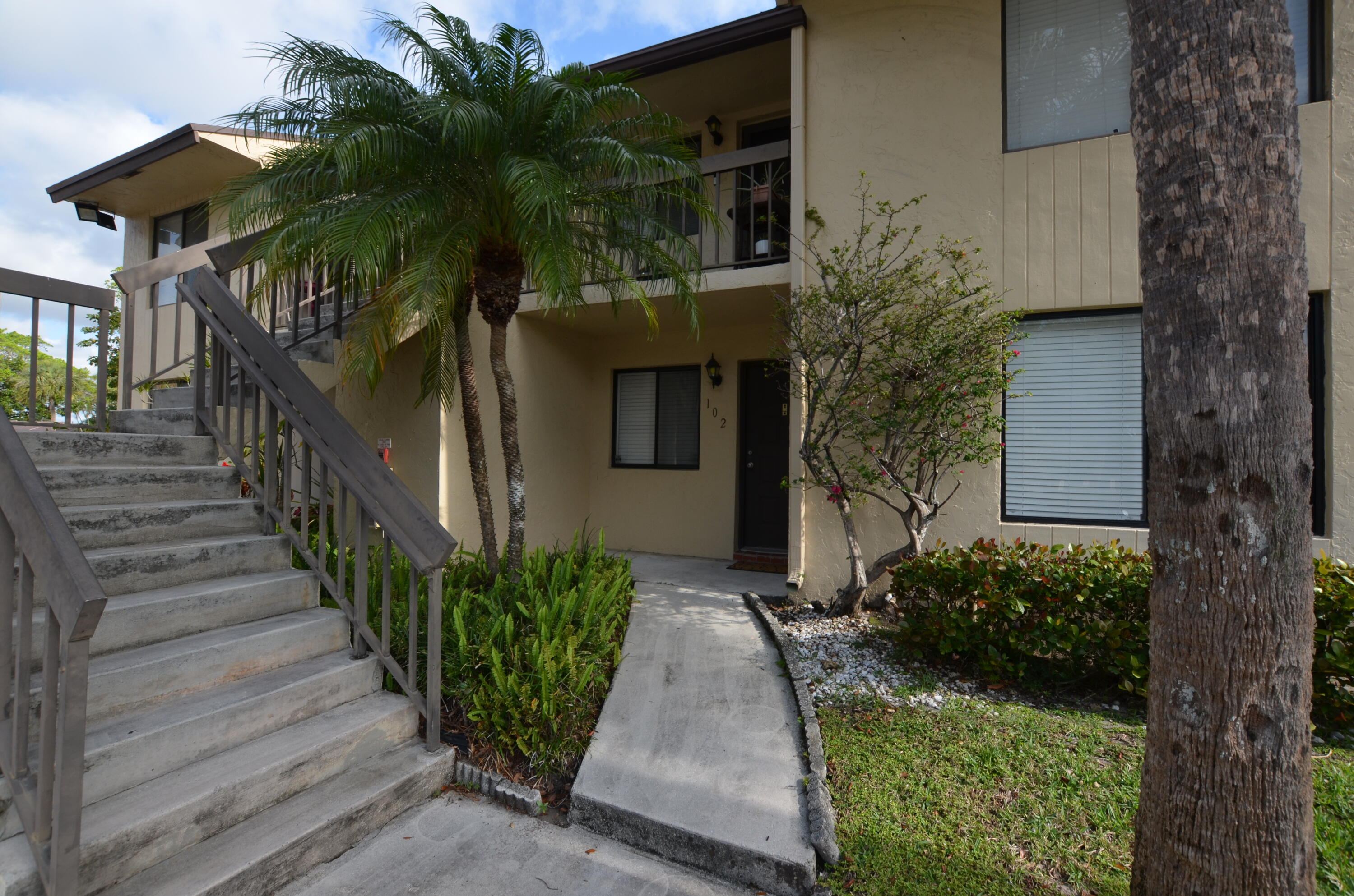 6649 Somerset Drive, Unit 102 Boca Raton, FL 33433 - Photo 1 of 19 a view of a house with a street