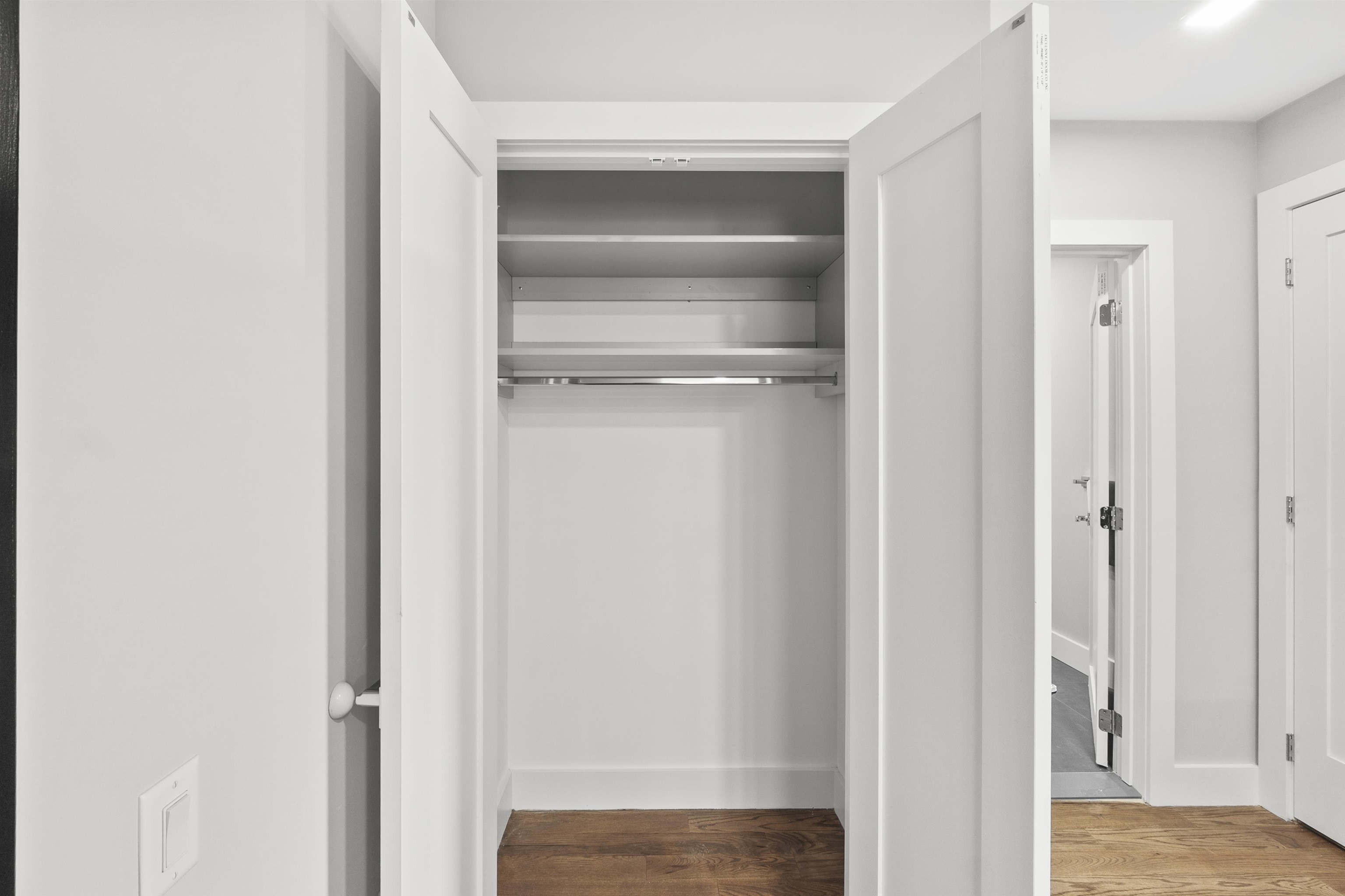 60-64 68th Street, Unit 208 Guttenberg, NJ 07093 - Photo 25 of 29 a view of kitchen and wooden floor